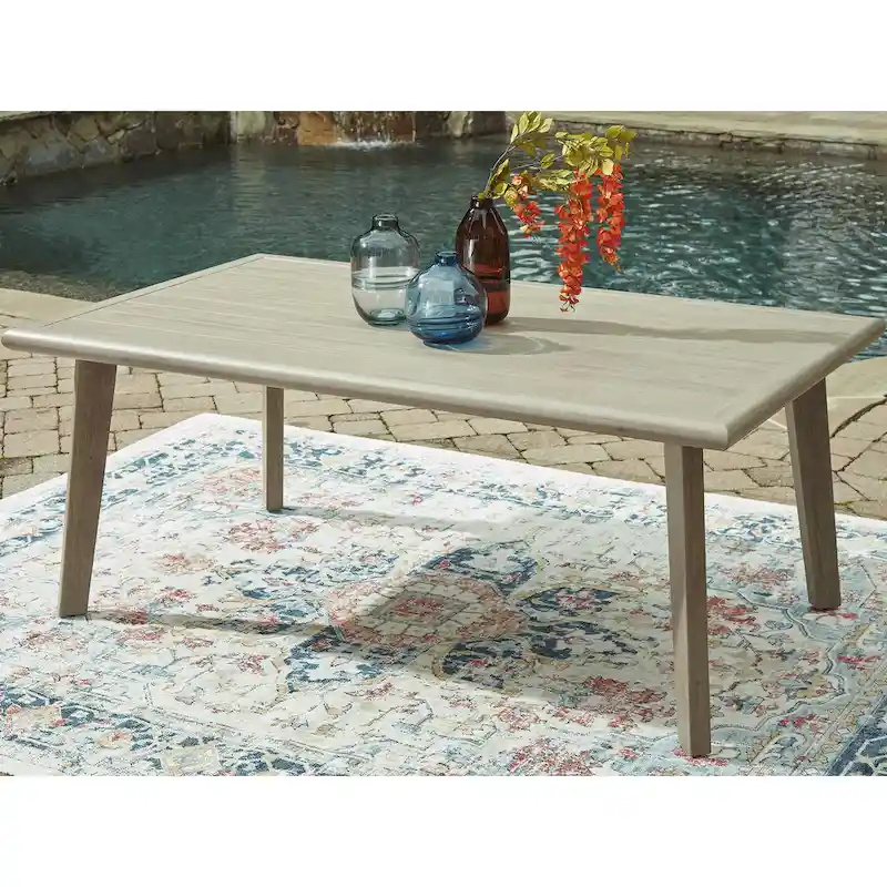 Signature Design by Ashley Haven Retreat Beige Rectangular Dining Table with Umbrella Hole - 42.13