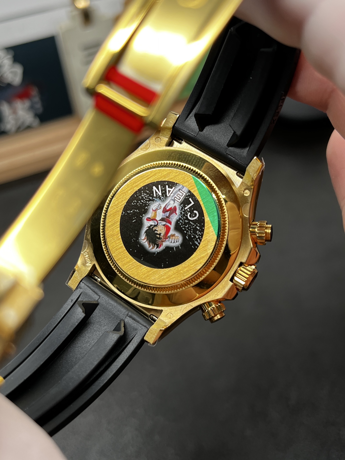Rolex Daytona replica caseback and Oysterflex attachment detail