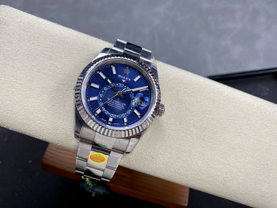 Rolex Sky-Dweller replica on display cushion angled view