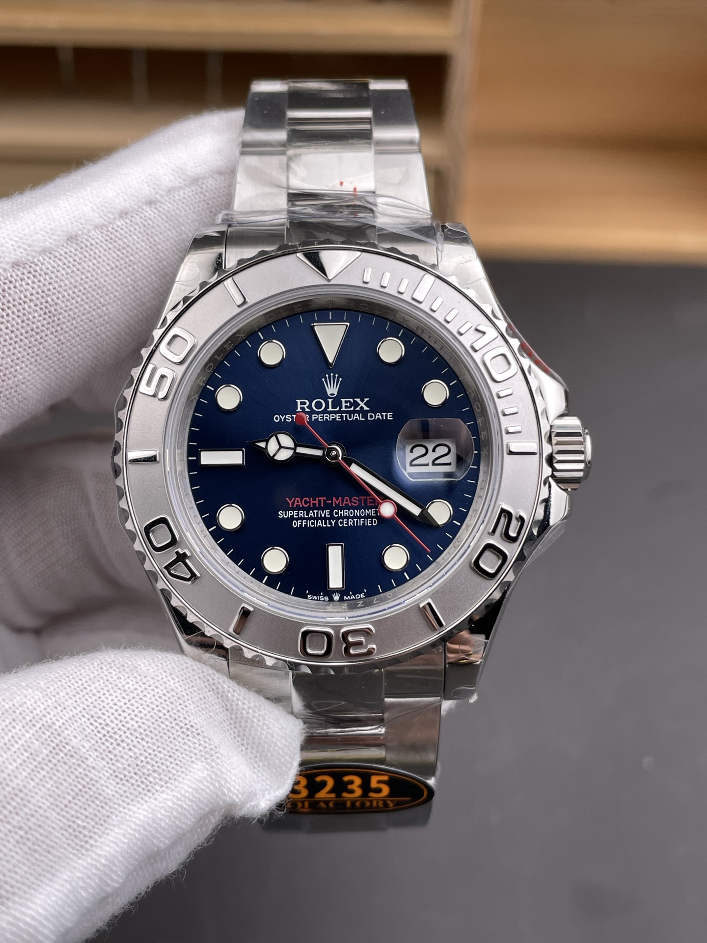 Rolex Yacht-Master replica watch front view with blue dial and silver bezel
