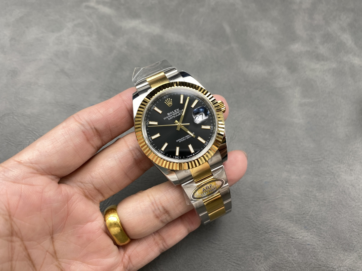 Rolex Datejust 41 two-tone on wrist in hand