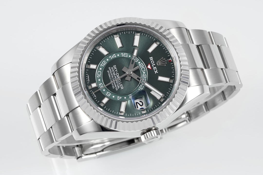 Rolex Sky-Dweller super clone side profile highlighting the fluted bezel, screw-down crown, and green dial with applied markers