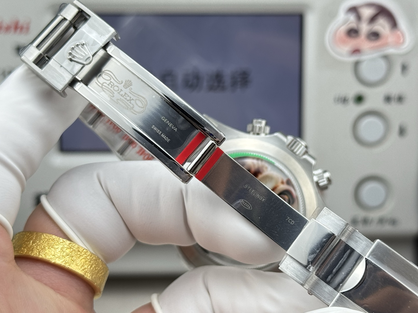 Detailed Rolex replica bracelet clasp engraving with 904L steel markings and Oyster system indicators showing superior finishing