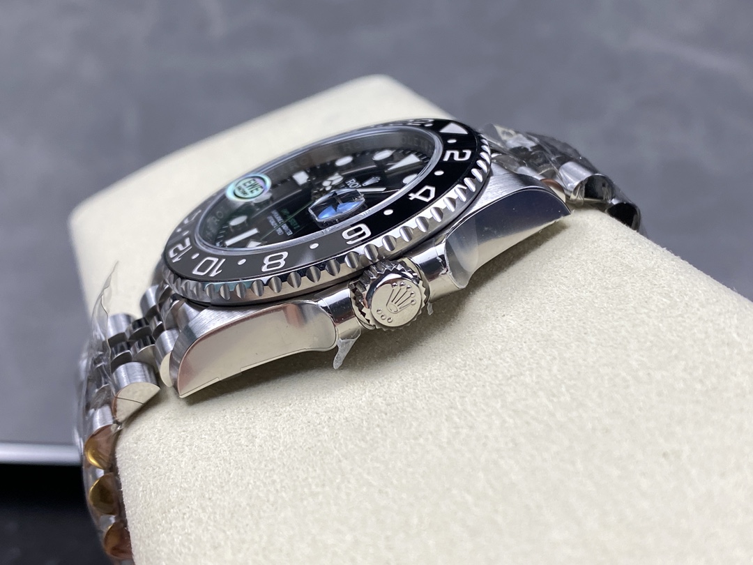 Side profile of Rolex GMT replica with crown and polished lugs