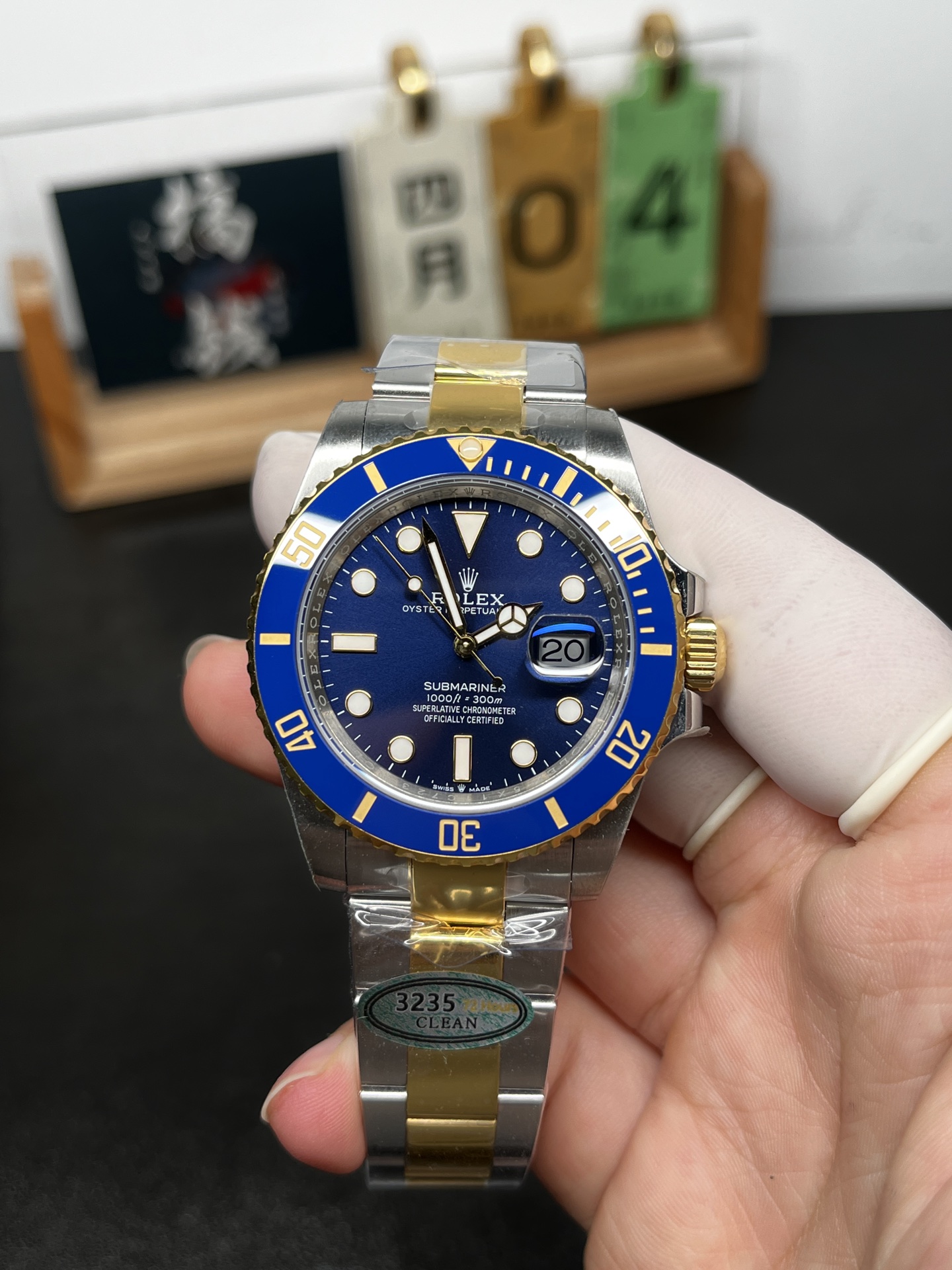 Fausse Rolex Submariner bleue Clean Factory vue de face avec lunette bleue et date