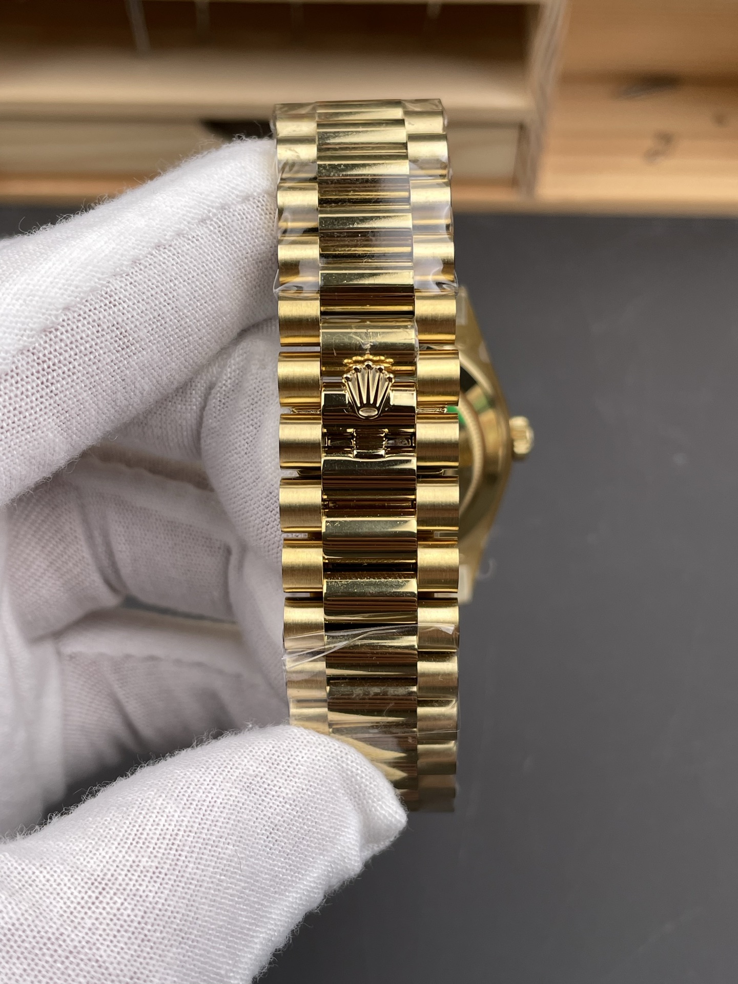 Gold President bracelet clasp on a Rolex Day-Date replica watch