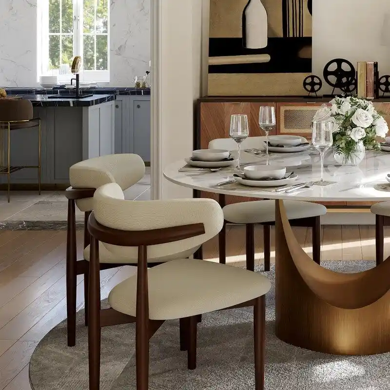Modern Round Dining Table – White Sintered Stone Top & Bronze Carbon Pedestal