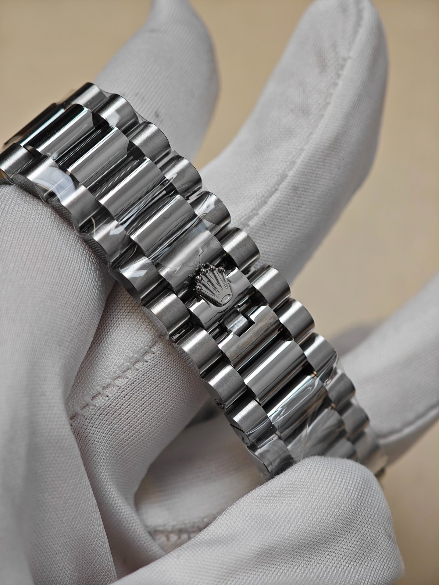 President bracelet clasp detail on a high end Rolex replica watch