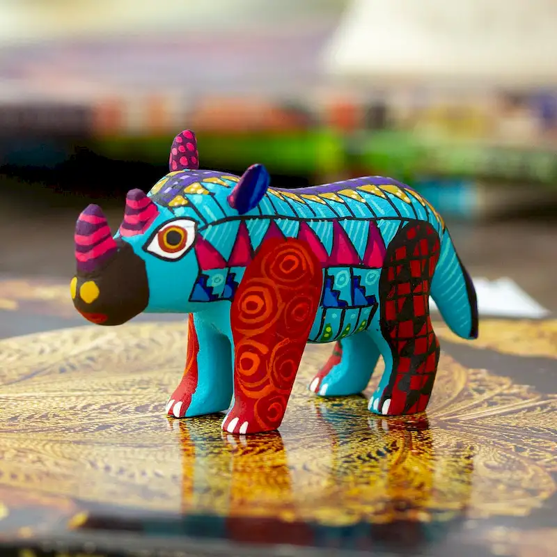 Novica Handmade Aquamarine Rhino Wood Alebrije Figurine