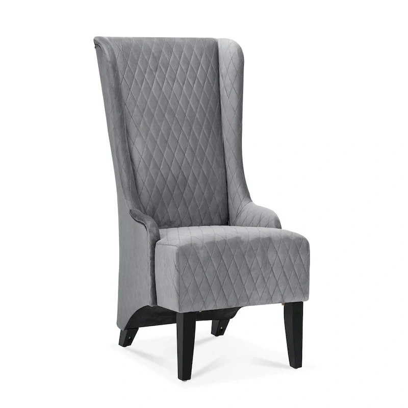 High-backed velvet wing-back chair with wooden legs