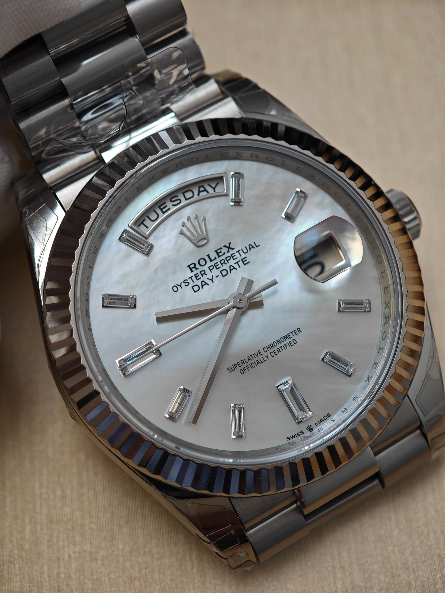 Mother of pearl Day-Date replica dial with baguette hour markers and fluted bezel