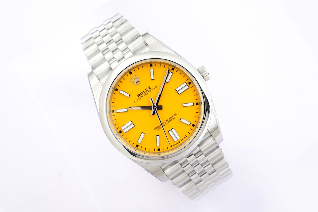 Rolex Oyster Perpetual replica with yellow dial and Jubilee bracelet