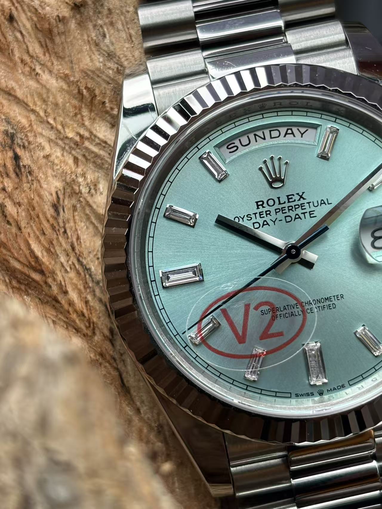 Rolex Day-Date replica dial close-up with Sunday display and baguette markers