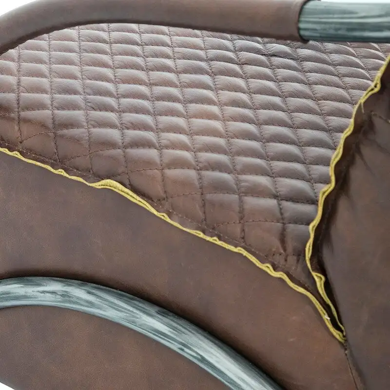 Davita Loft Brown Tufted Leather Accent Chair with Cast Iron Base