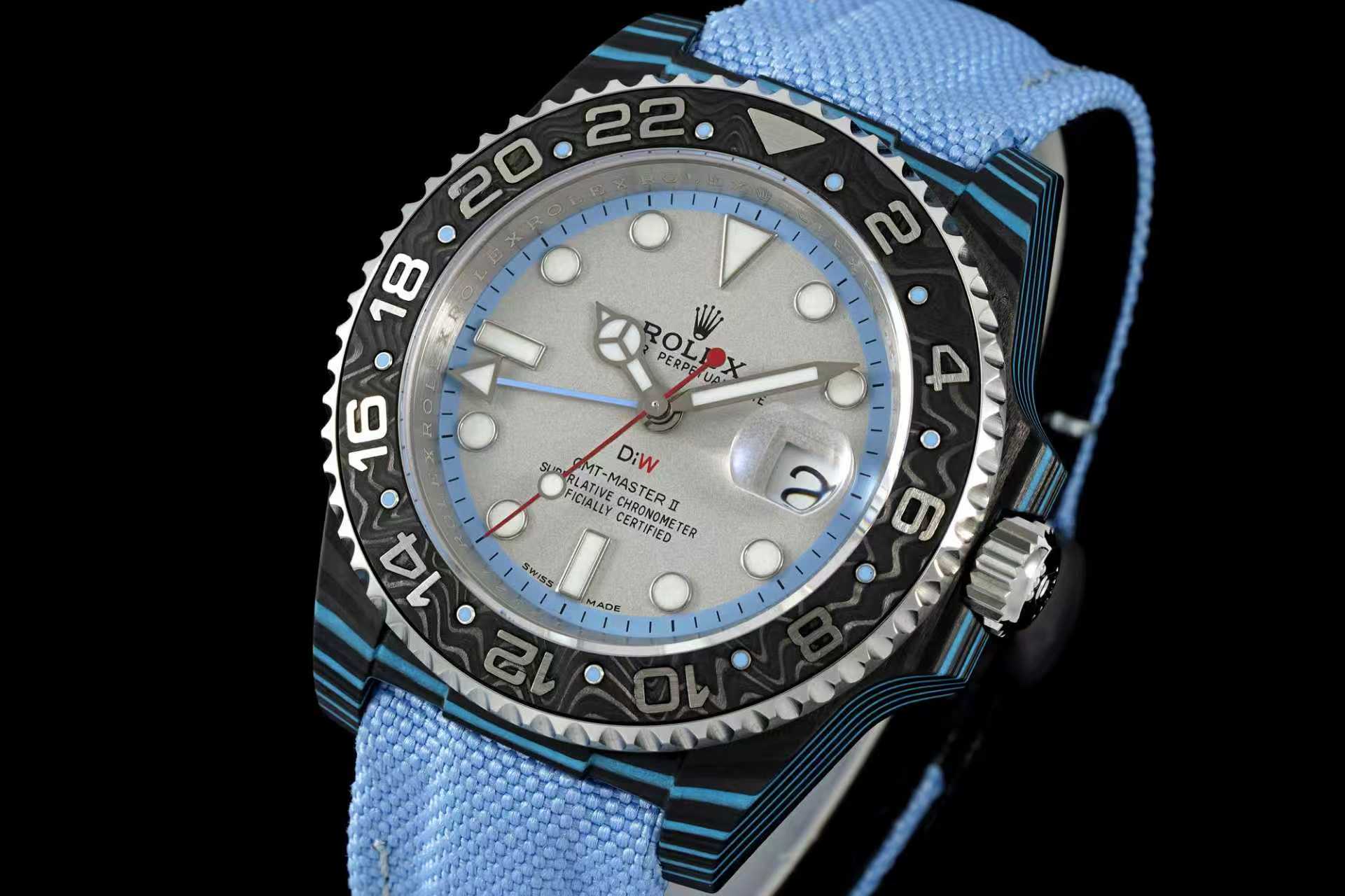 Close-up angle of GMT-Master II dial featuring red GMT hand and blue bezel markings