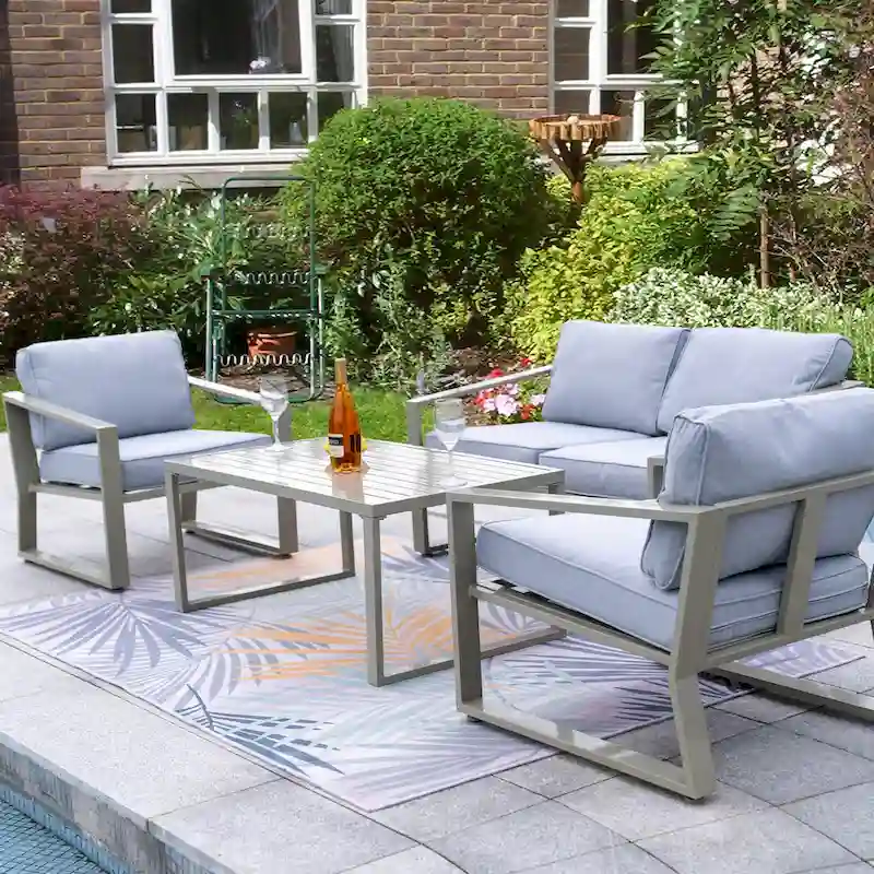 4-piece Patio Conversation Set with Coffee Table and Cushions
