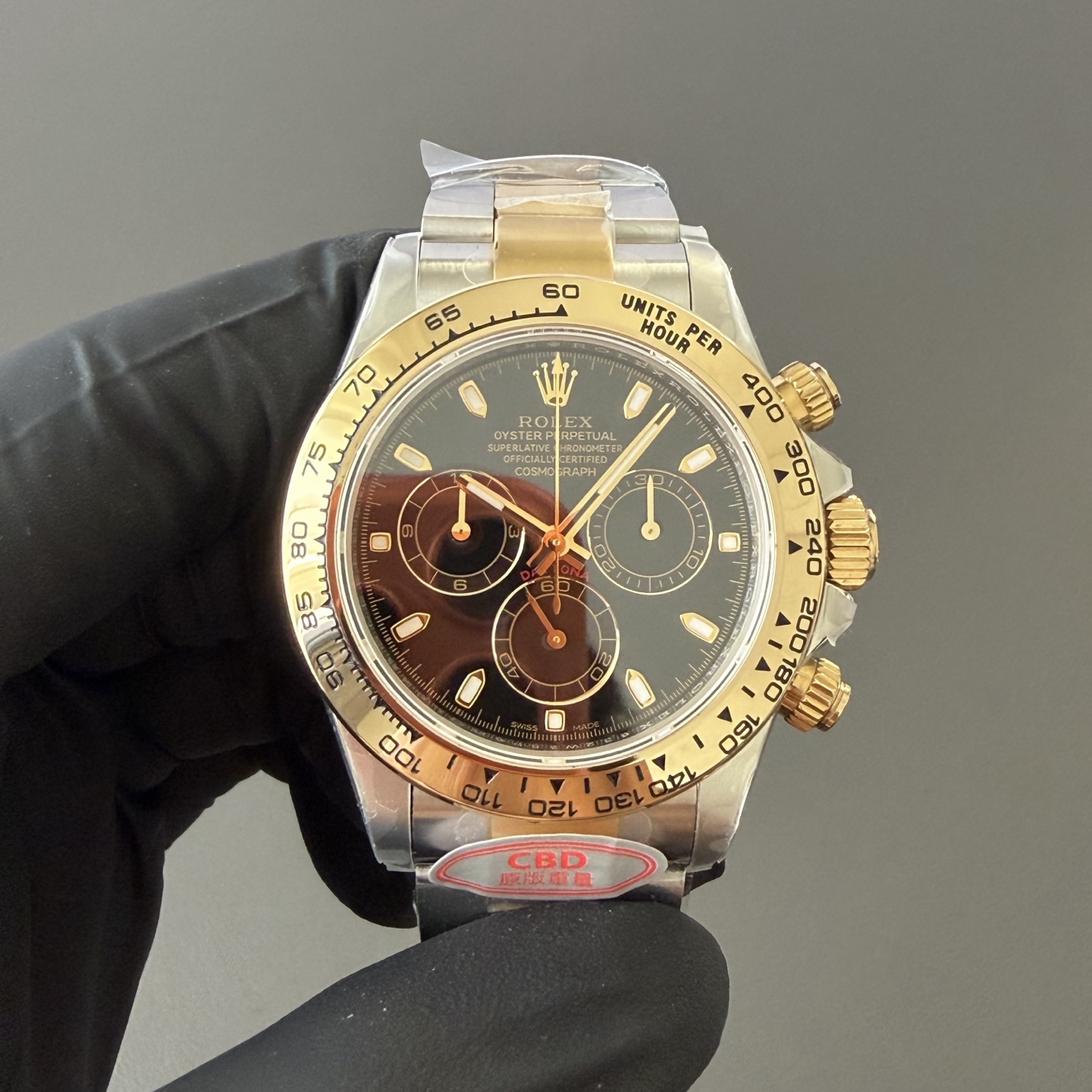 Rolex Daytona 4130 clone black dial gold bezel and steel case chronograph