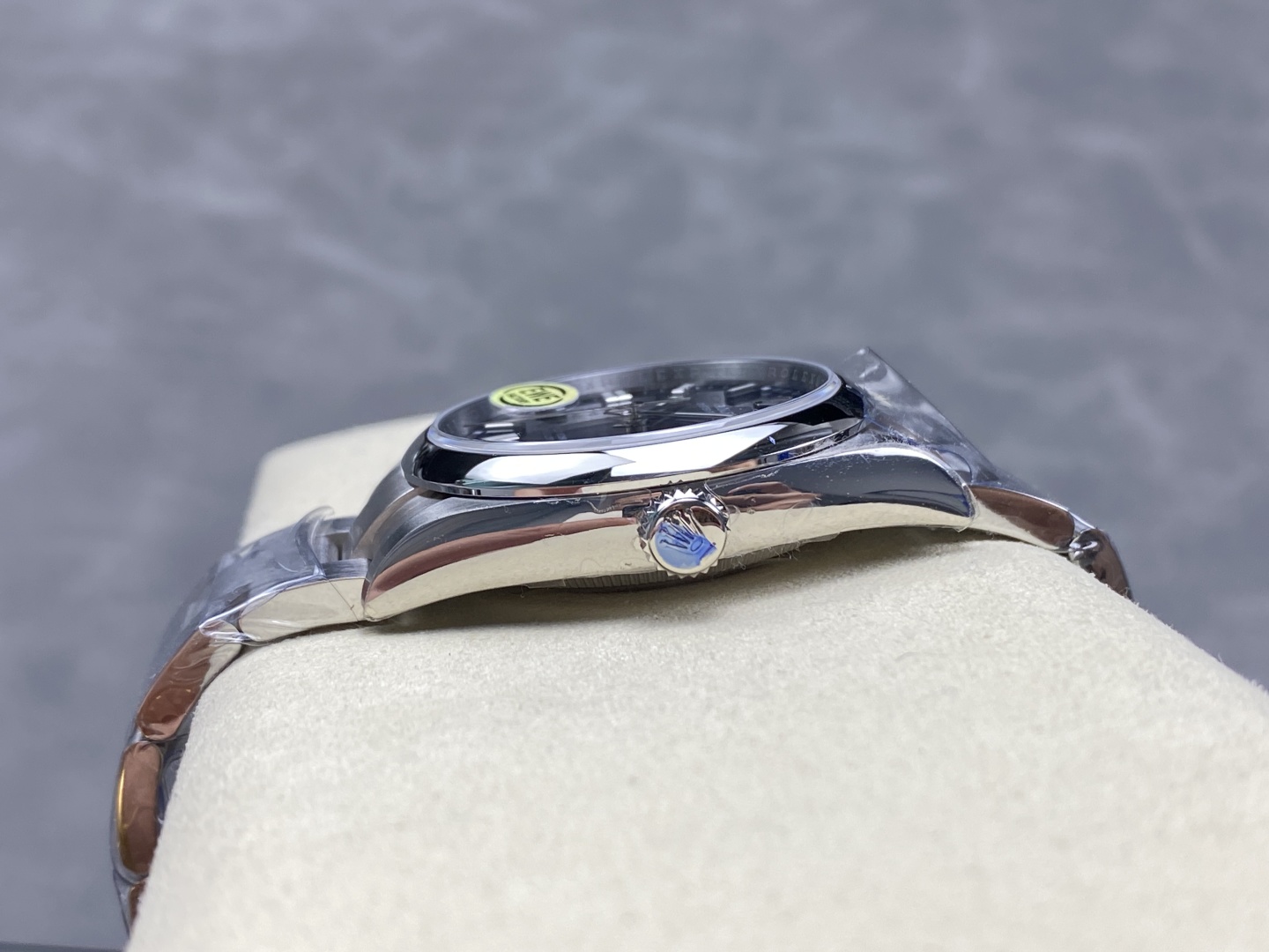 side profile of fake rolex showing crown and case thickness