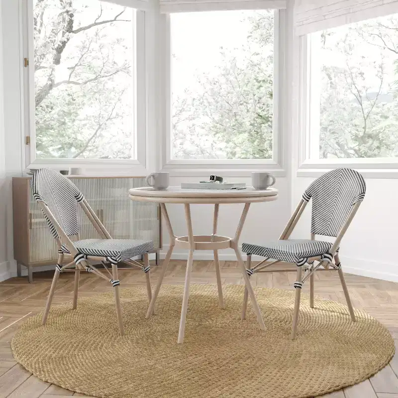 Merrick Lane Celia Bistro Style Table with Glass Top, PE Rattan, 4 Stack Chairs, and Bamboo Finished Metal Frame for Indoor/Outdoor Use