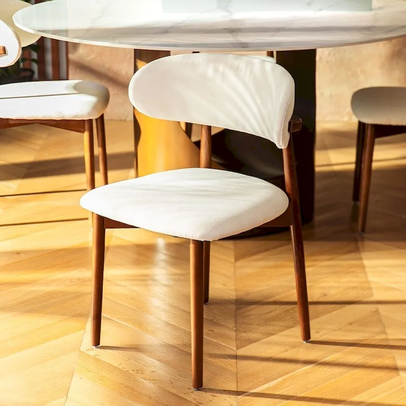 Modern Round Dining Table – White Sintered Stone Top & Bronze Carbon Pedestal