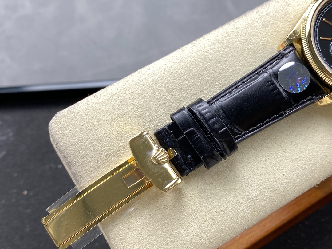 Rolex folding clasp and black leather strap close-up
