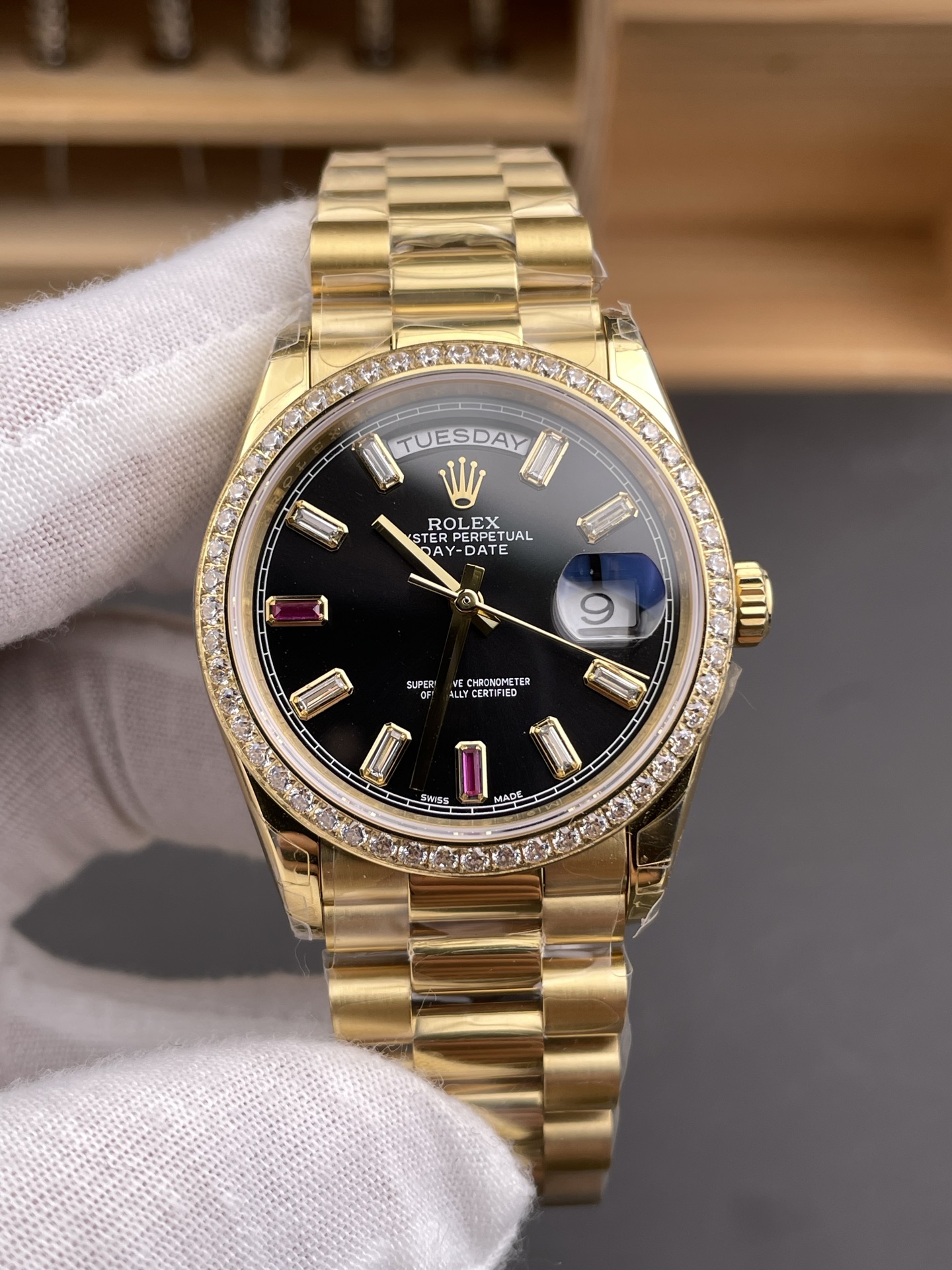 Rolex Day-Date replica 3255 front view black dial diamond bezel yellow gold bracelet