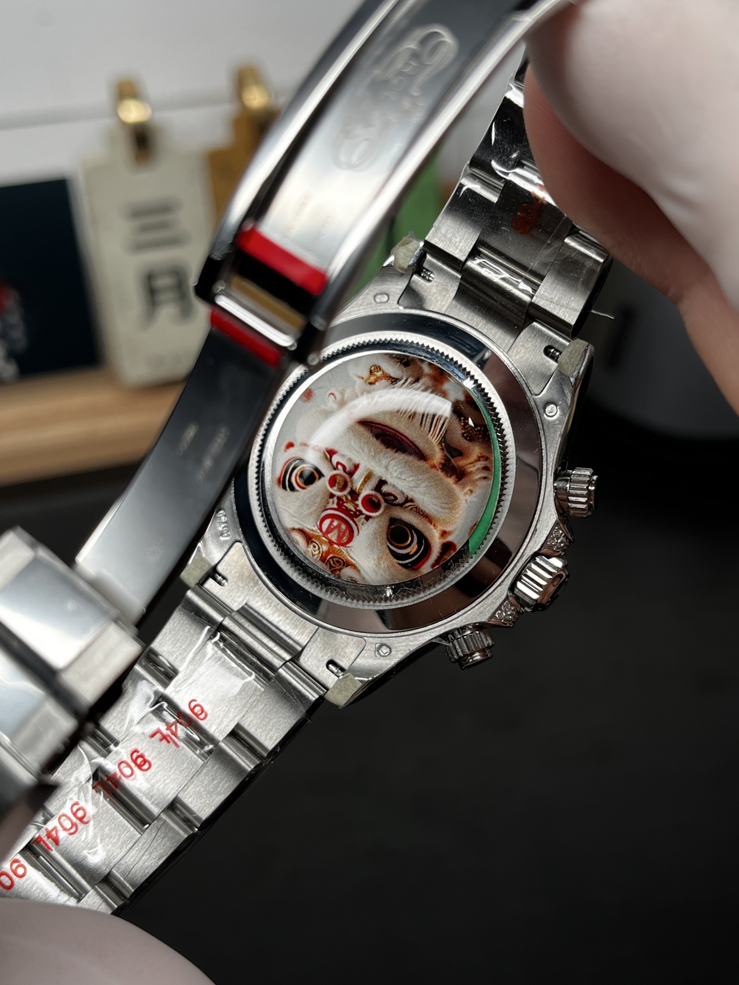 Decorative caseback detail on stainless steel fake Rolex Daytona replica watch