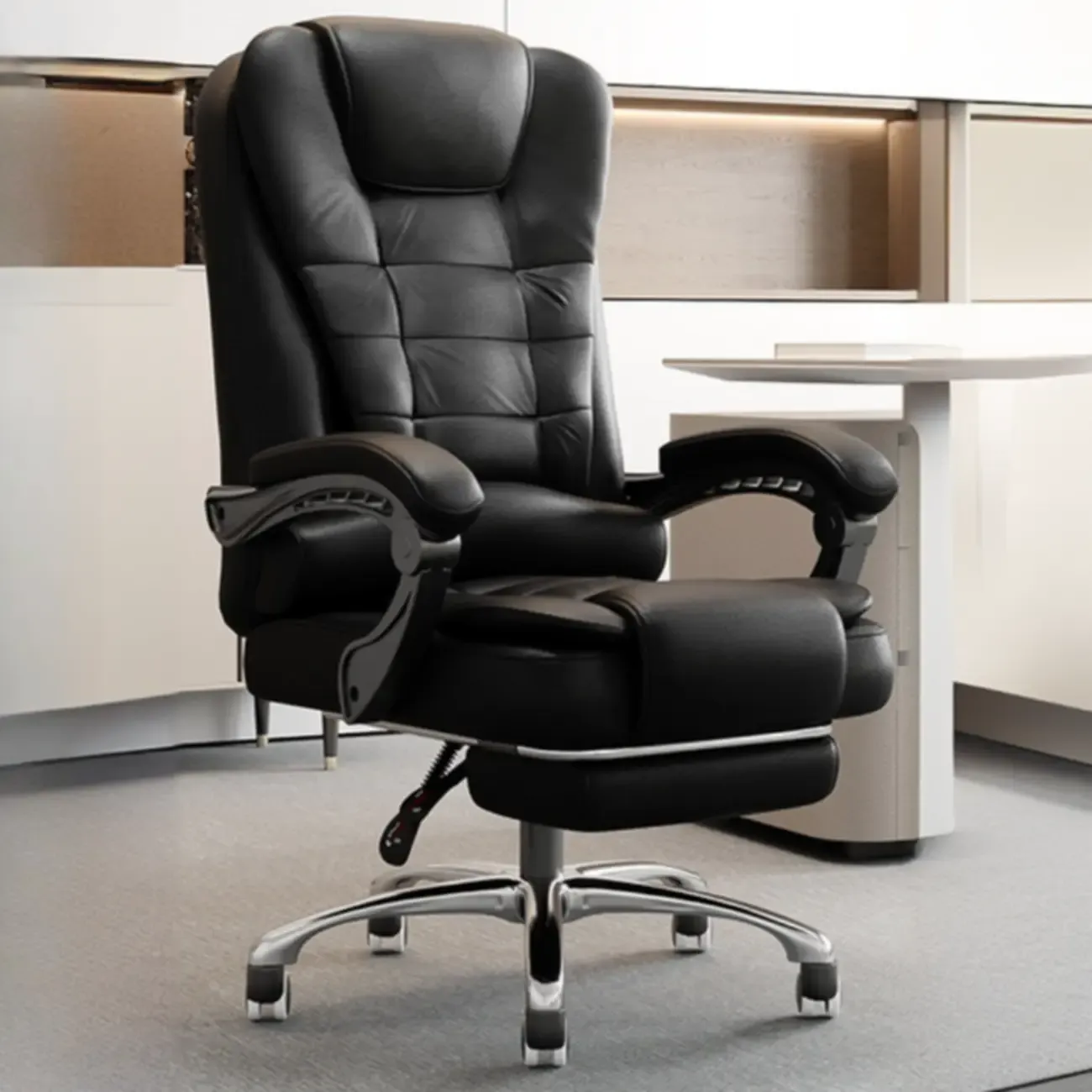 Ergonomic Black Leather Swivel Office Chair with Footrest
