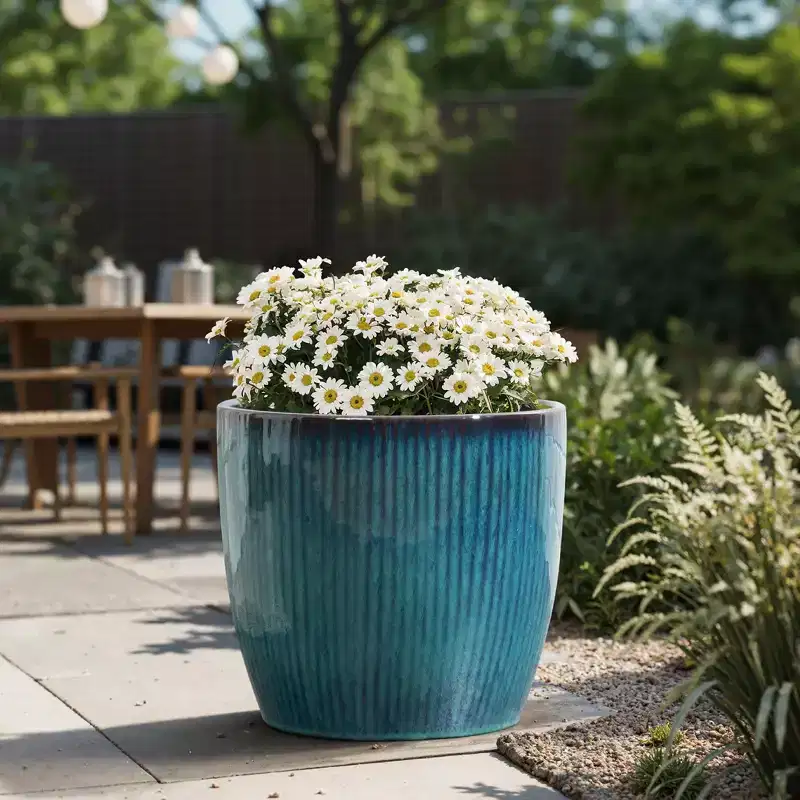 LuxenHome Forest Fade Ribbed Ceramic Planter, Glossy Blue-Green Pot with Brown Rim
