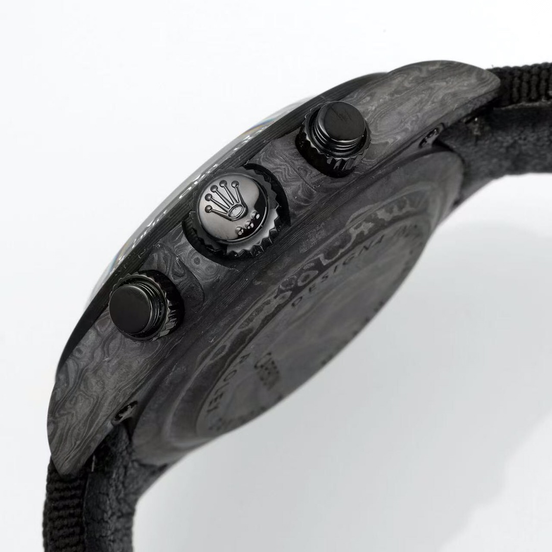 Carbon Daytona side profile with black pushers and crown