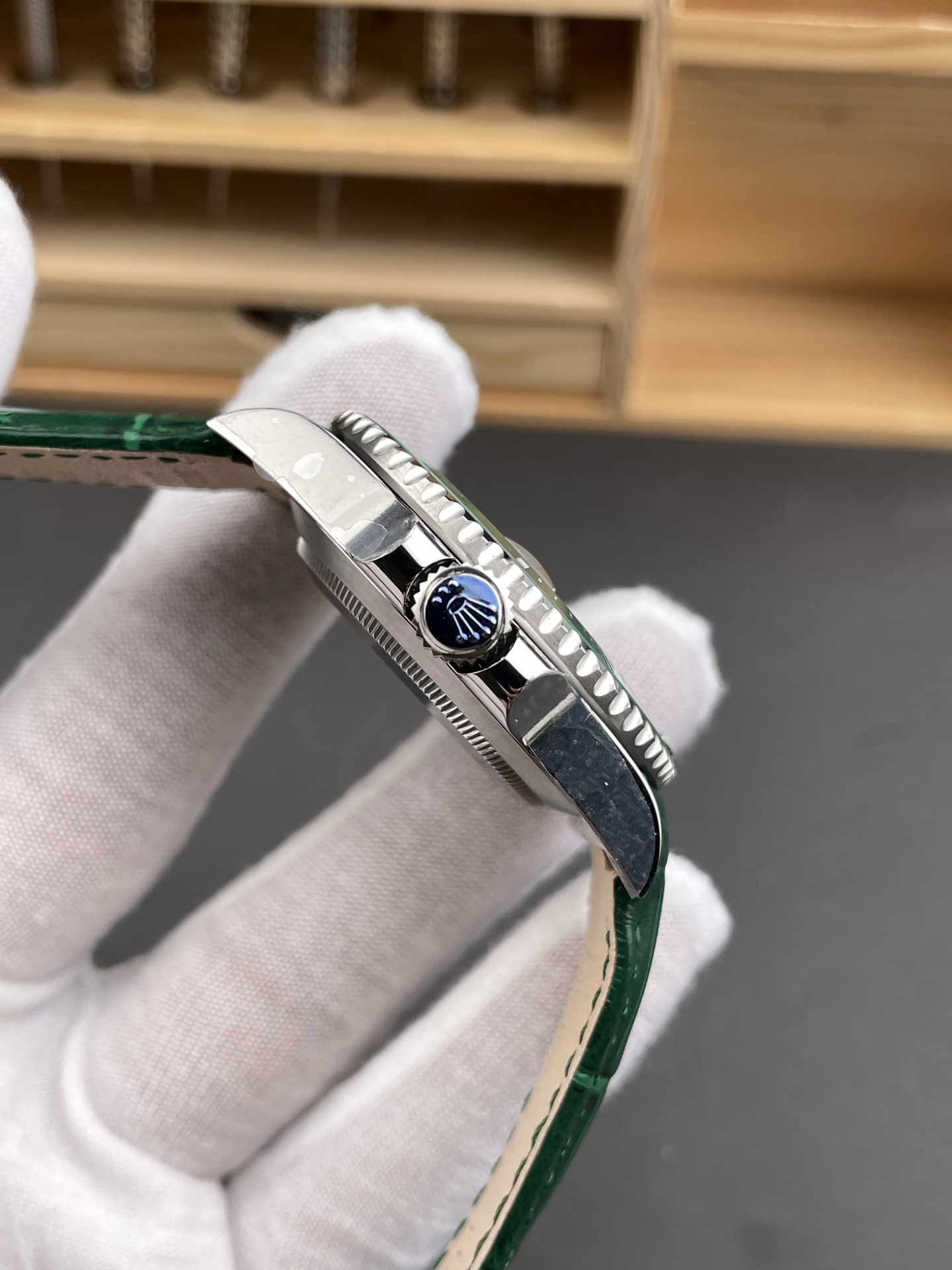 Green Rolex Submariner replica side crown profile