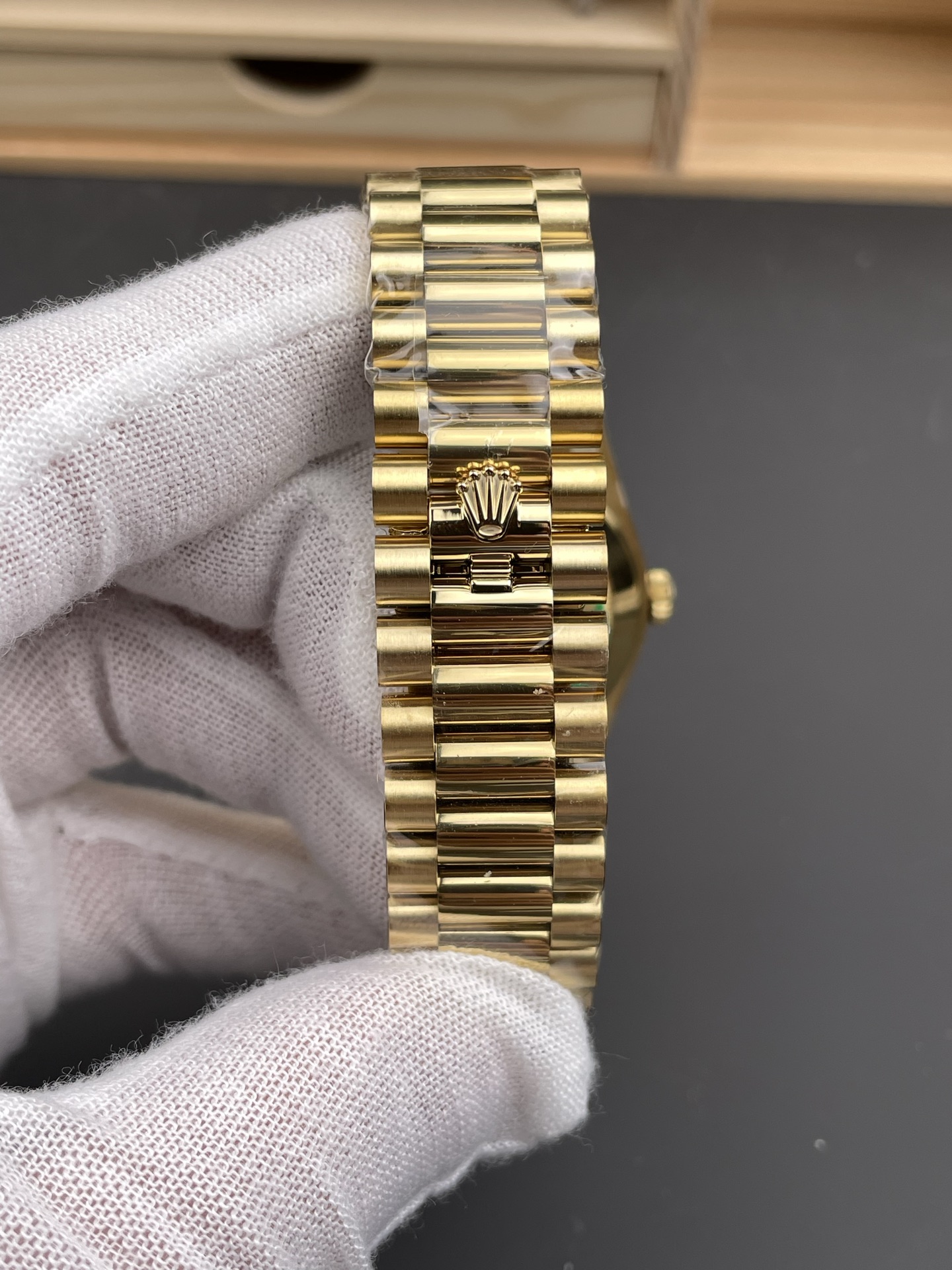 Gold Rolex Day-Date replica bracelet clasp with crown logo