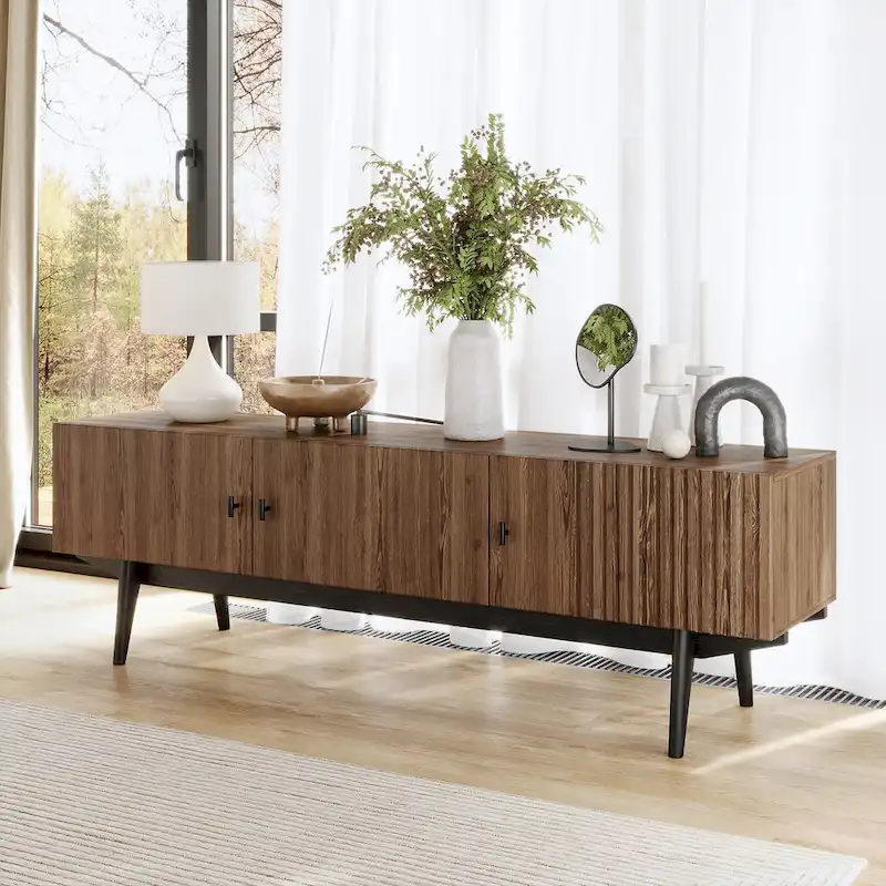 Brown TV Stand — Accommodates TVs up to 65 inches, featuring a slatted design and solid wood legs.