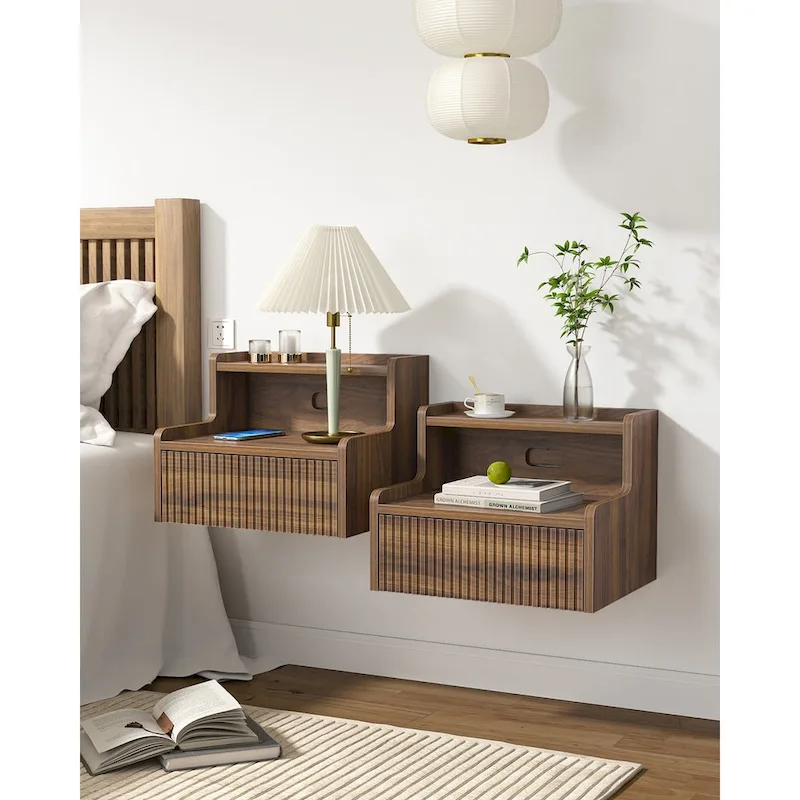 Modern floating bedside table with storage drawers and open shelves.