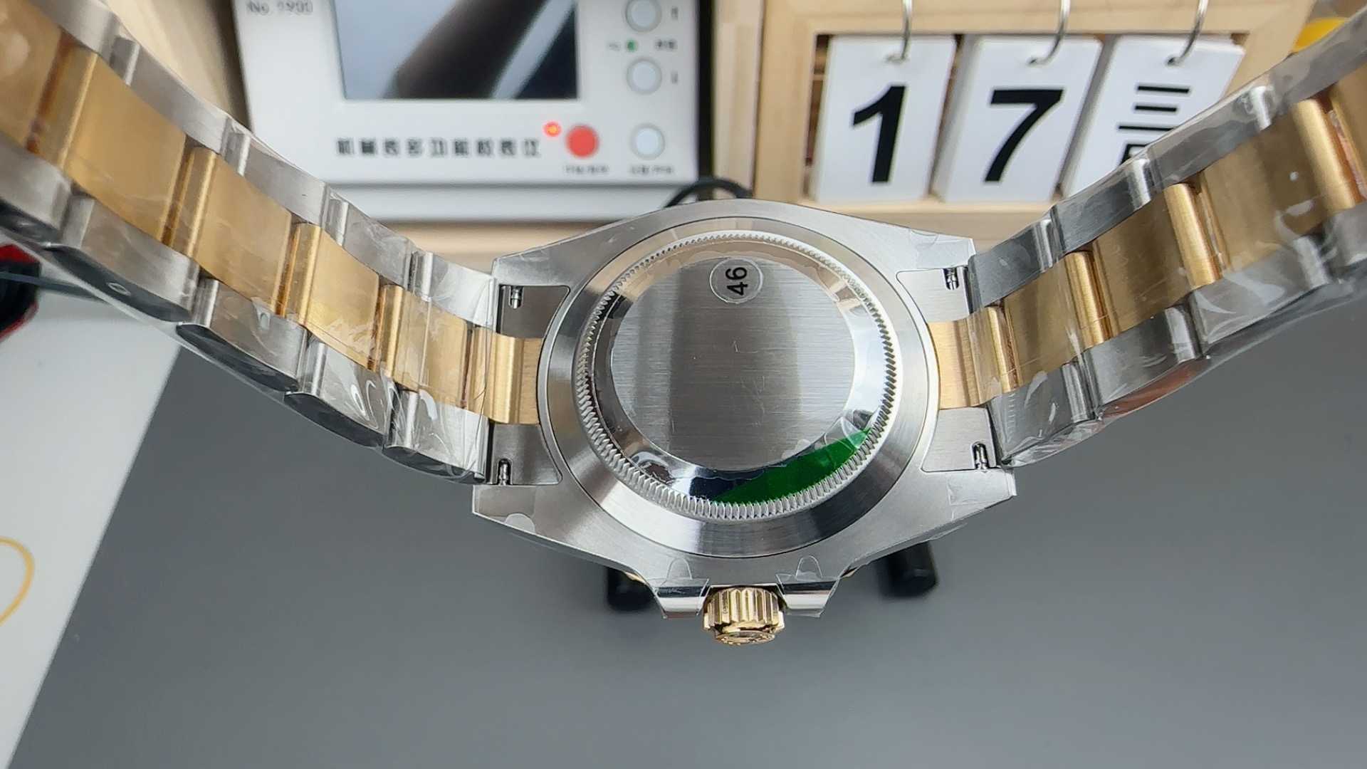 Back case and bracelet view of two tone replica Rolex Submariner