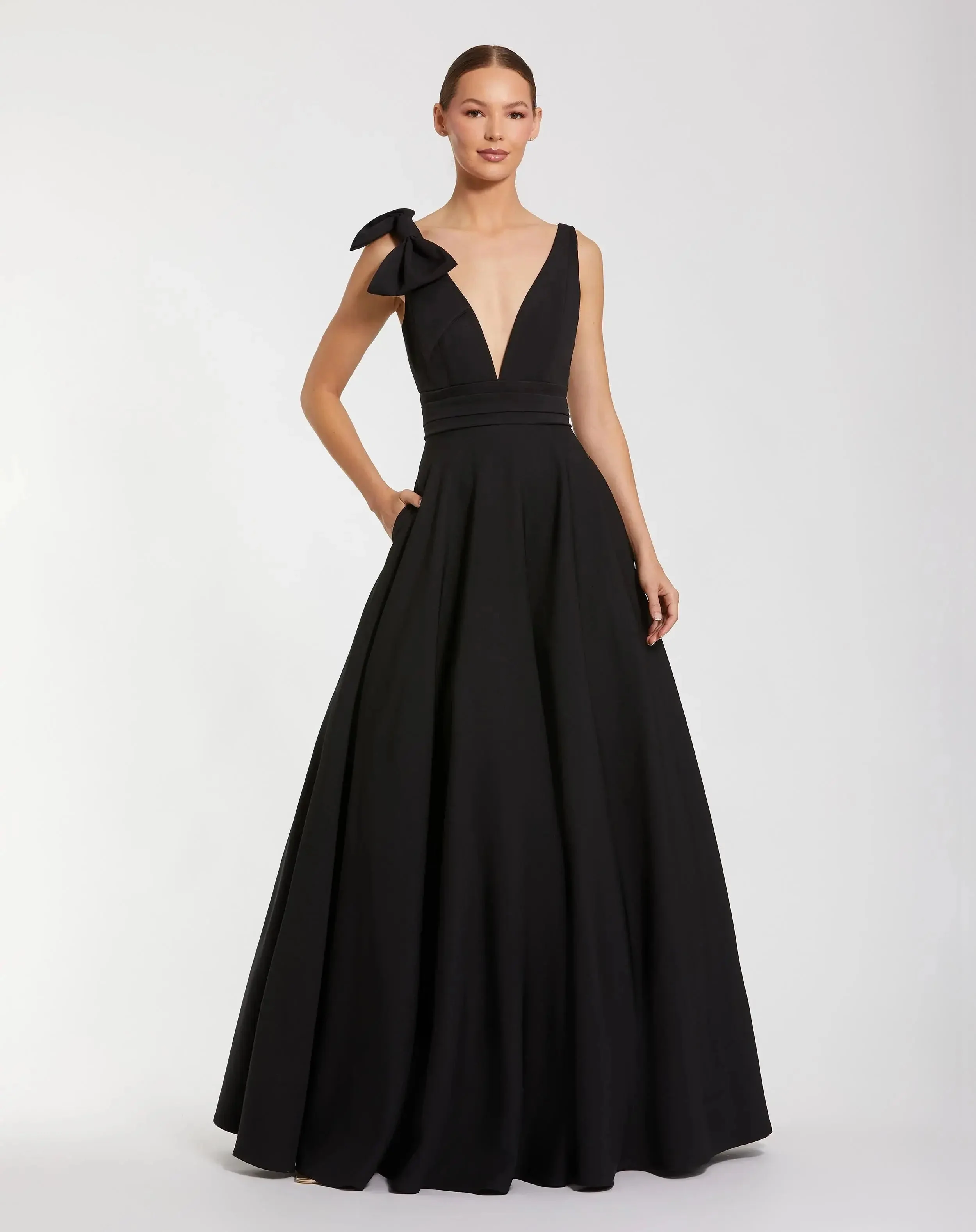 Sleeveless Plunge Neck Crepe Ballgown With Bow Detail