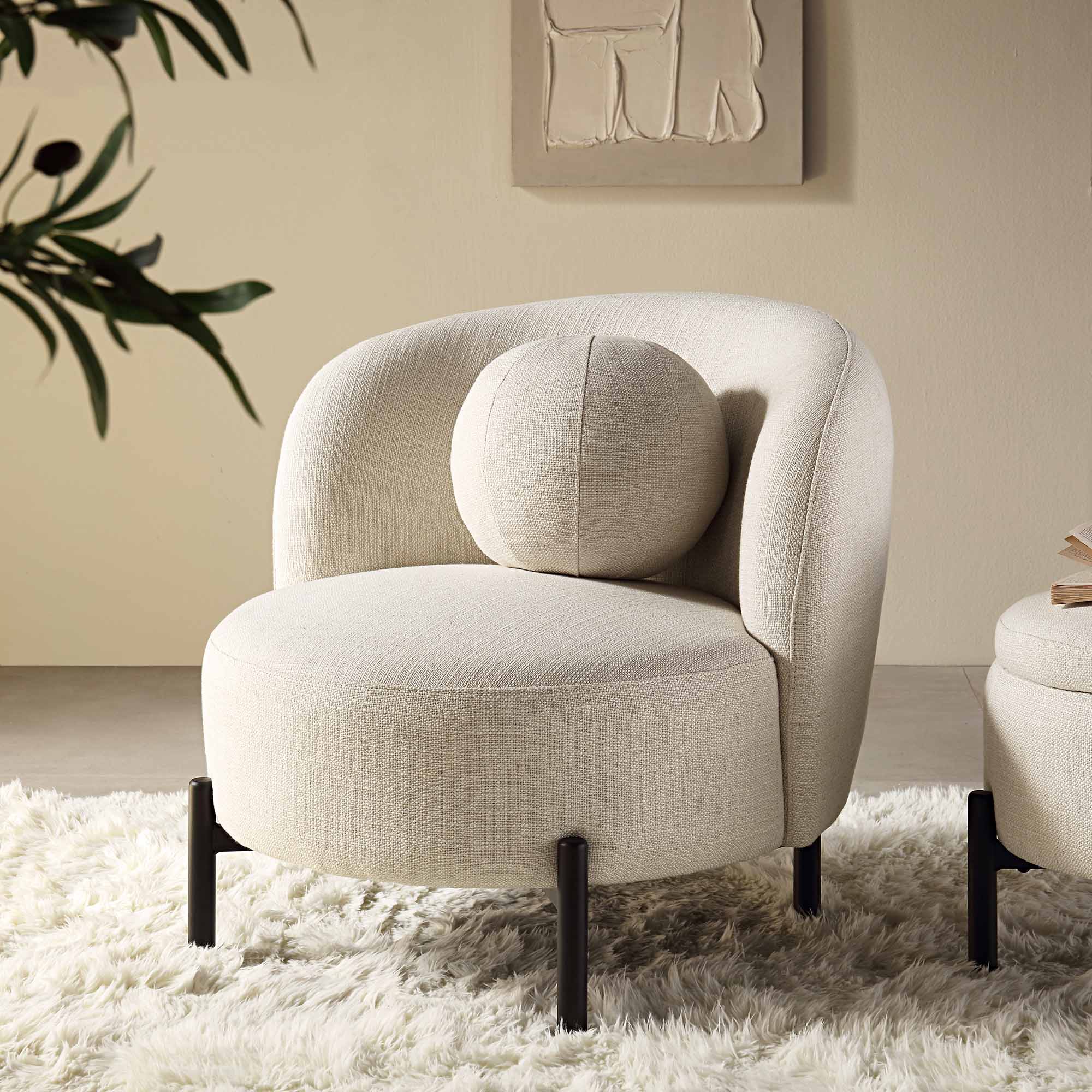 Beige linen-blend armchair with spherical seat, curved design, 31.5 inches wide, suitable for living room use.