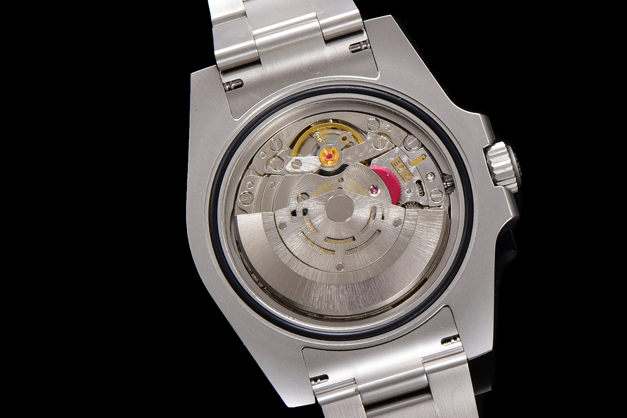 Transparent case back revealing the automatic movement with oscillating rotor and precision components in a Rolex watch