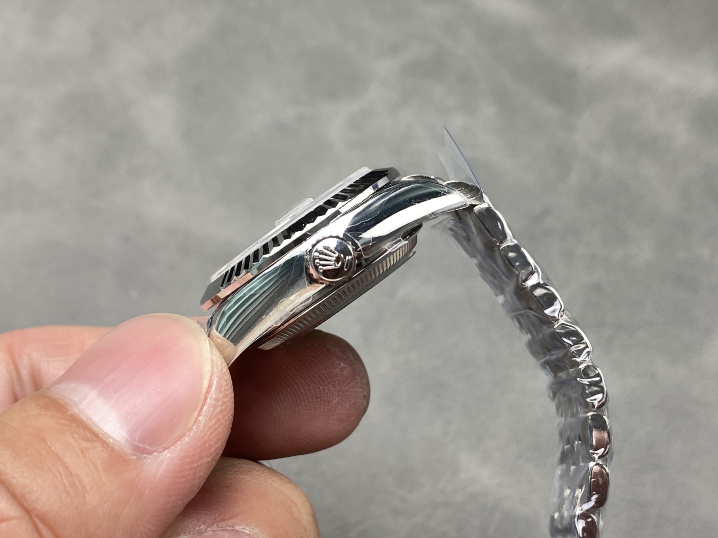 Side profile and crown of a rolex super clone Datejust
