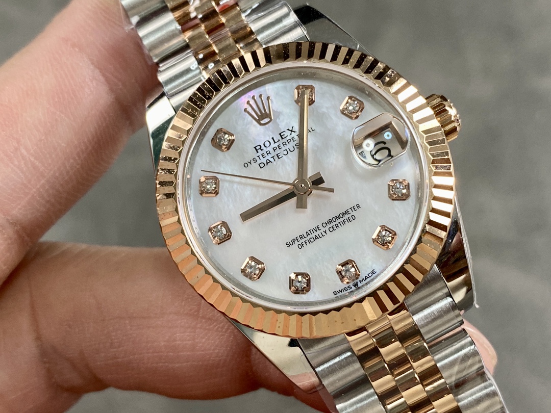 Close-up of a replica Rolex Datejust with mother-of-pearl dial, diamond hour markers, and rose gold bezel – demonstrating the 2236 clone movement in a classic two-tone case.