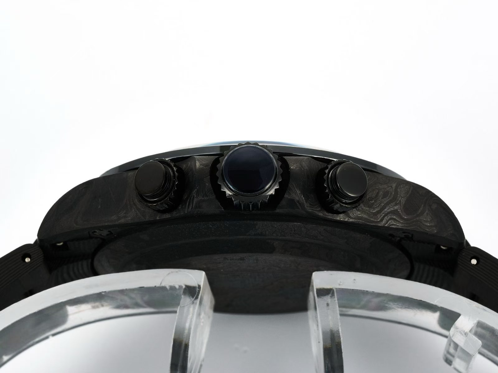 Side profile with pushers and crown of replica chronograph