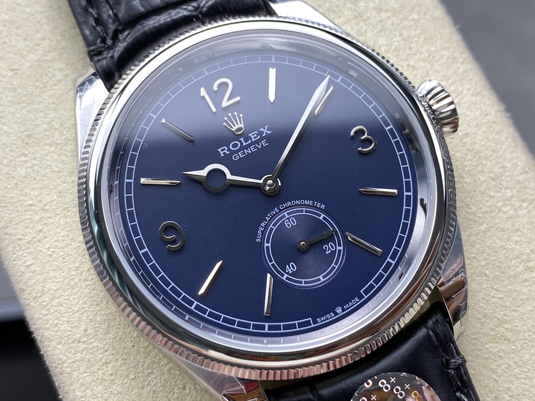 Macro shot of replica Rolex 1908 blue dial with Arabic numerals and small seconds