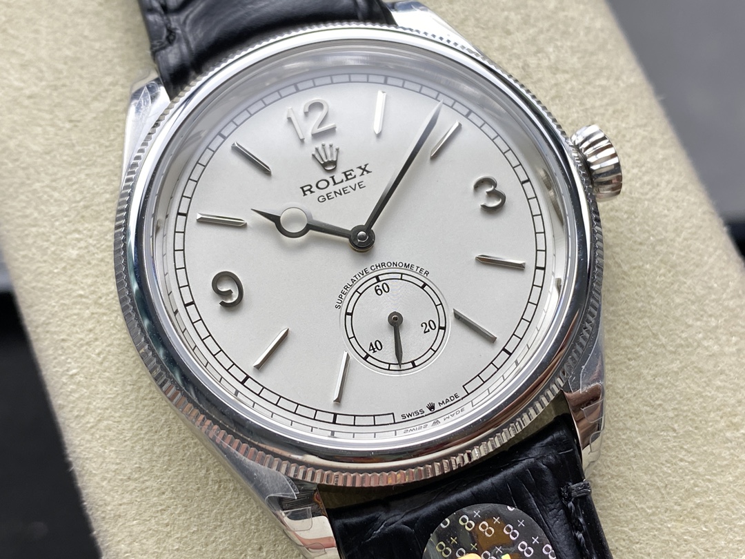 Replica Rolex Perpetual 1908 with white dial, small seconds subdial, and black leather strap.