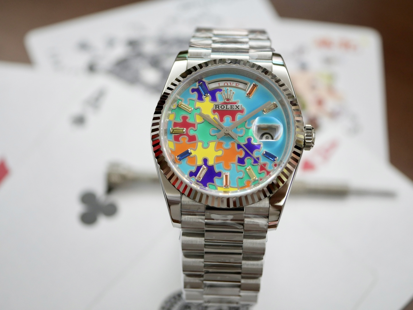 Rolex Day Date replica with a colorful puzzle dial and President bracelet