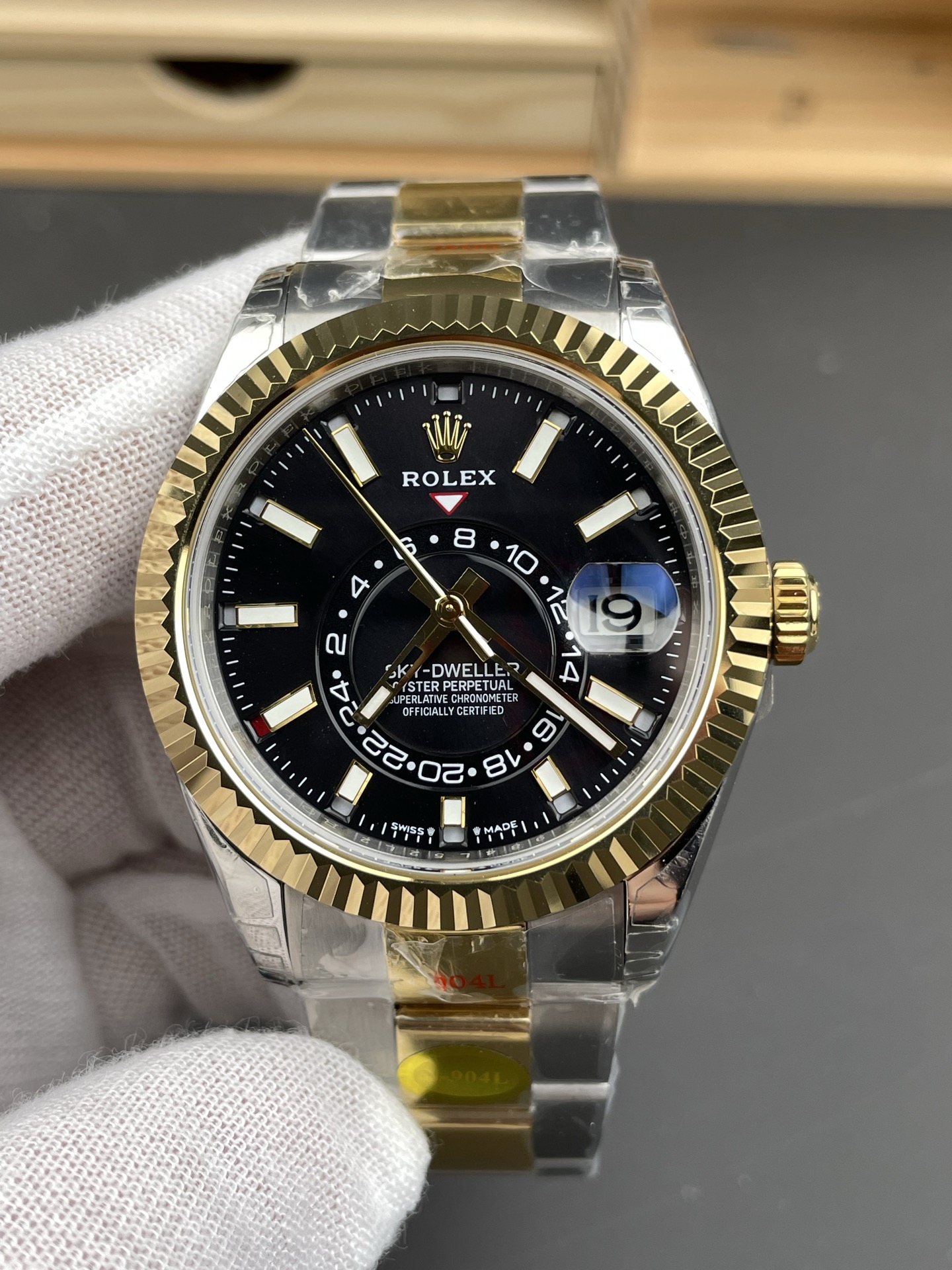 High quality replica Rolex Sky-Dweller with black dial and gold bezel