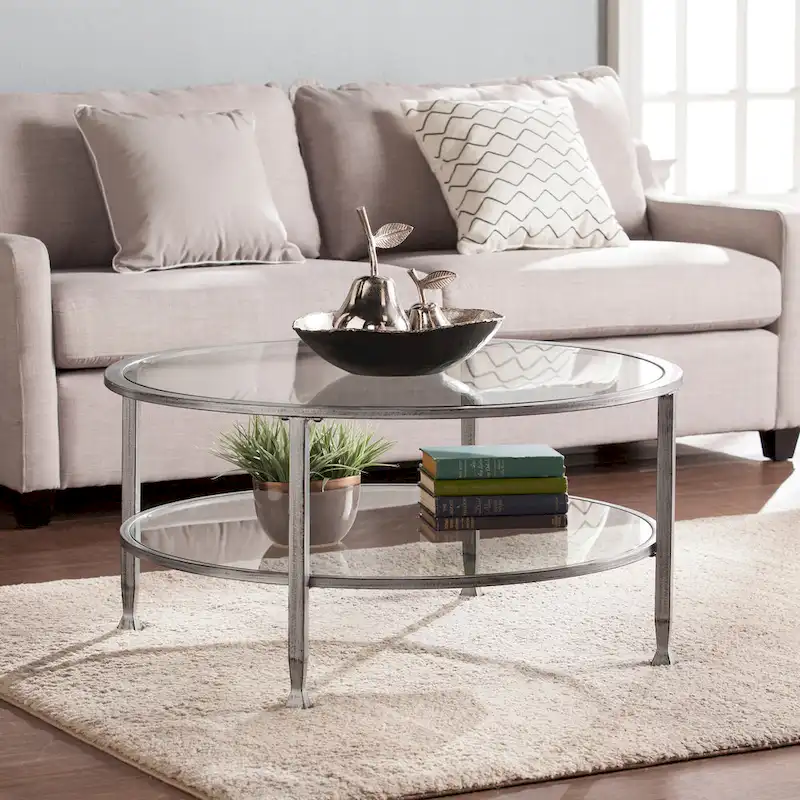 SEI Furniture Glenn Distressed Silver Round Coffee Table with Glass Top and Shelf