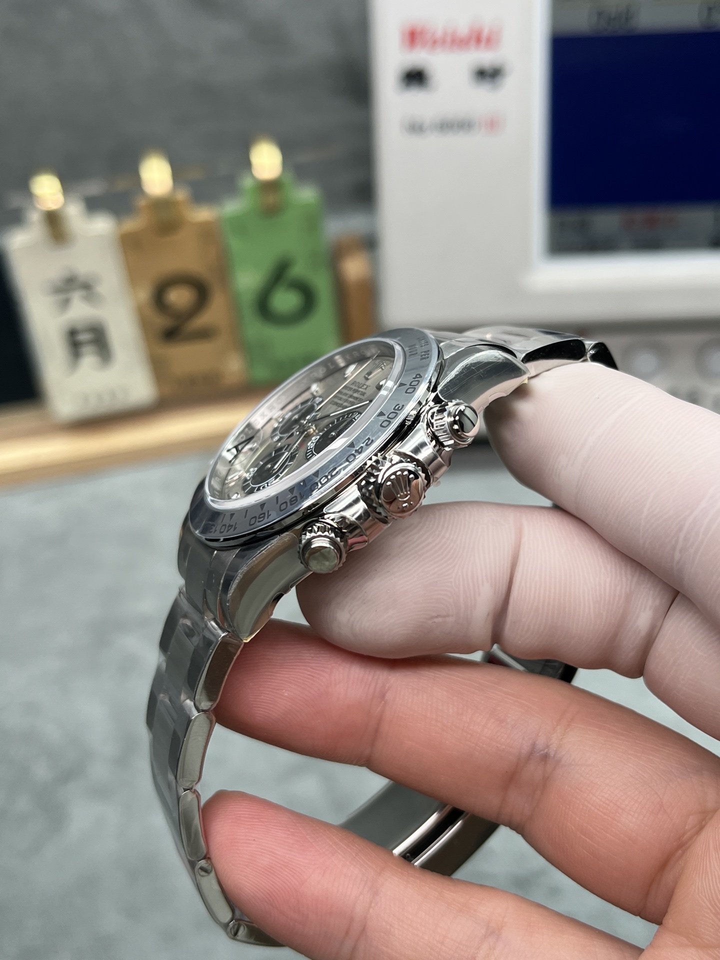 Side profile of Rolex Daytona replica showing case thickness and pushers