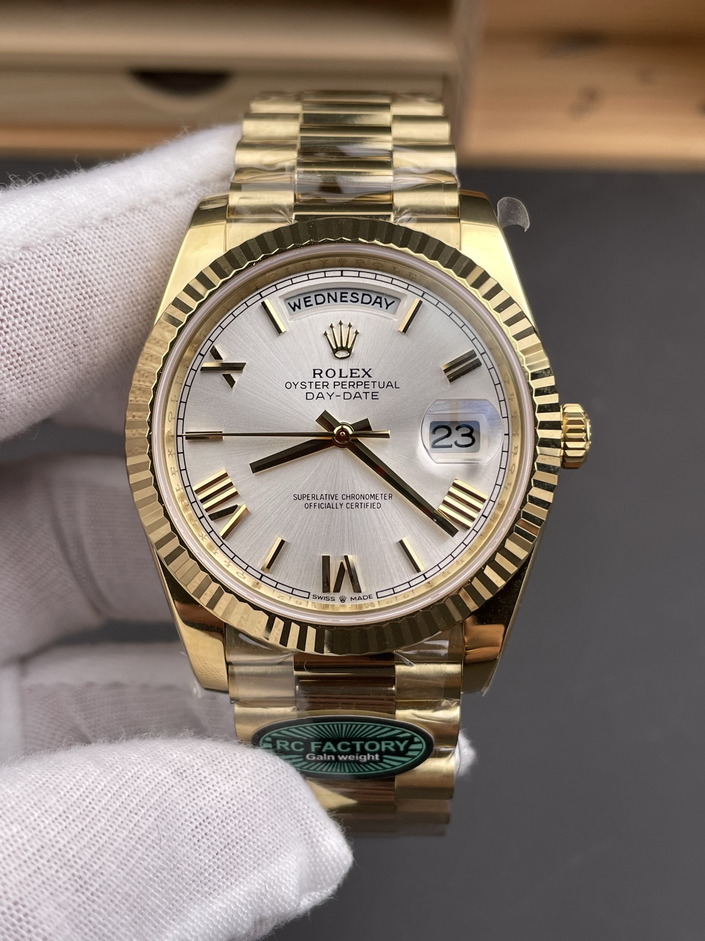 Gold Rolex Day-Date replica front dial with fluted bezel and President bracelet