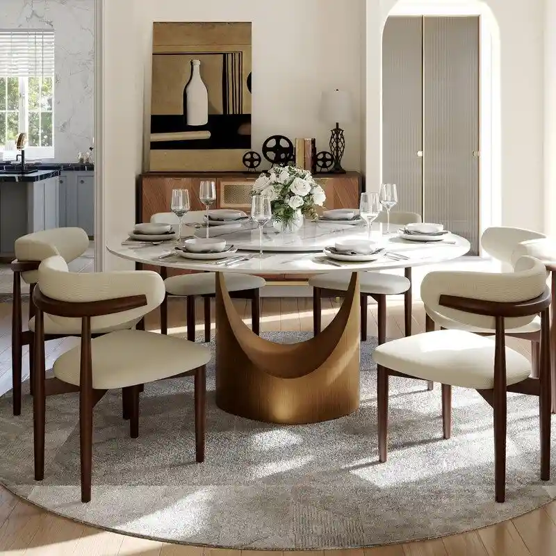 Modern Round Dining Table – White Sintered Stone Top & Bronze Carbon Pedestal
