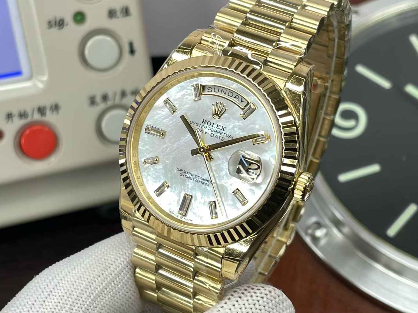 Gold Rolex Day-Date replica angled dial view with mother of pearl face